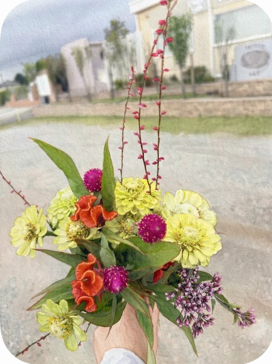 霊園の駐車場で手に持った月命日のお花